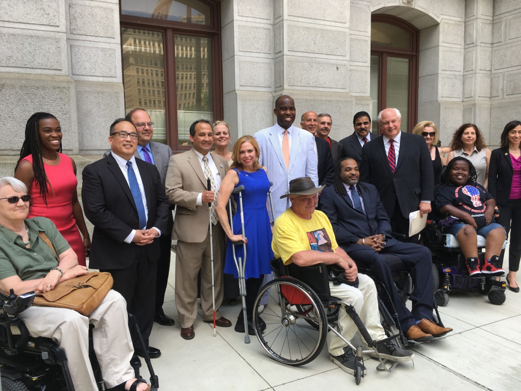 Featured image of a blog showing That people are standing for Philadelphia Office for People with Disabilities: