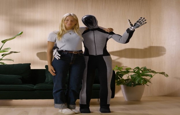 Humanoid robot with girl standing