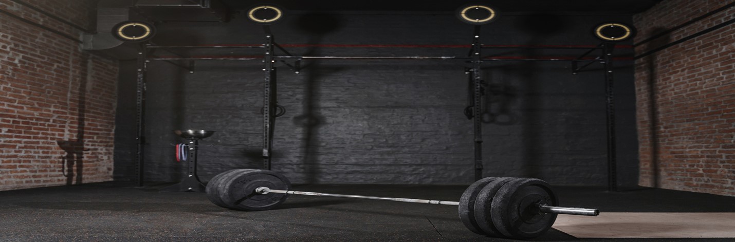 Gym equipment set up in room