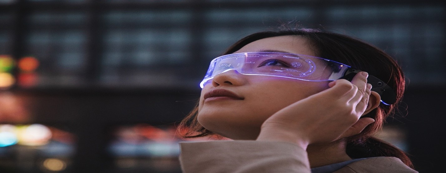Woman wearing futuristic smart glasses