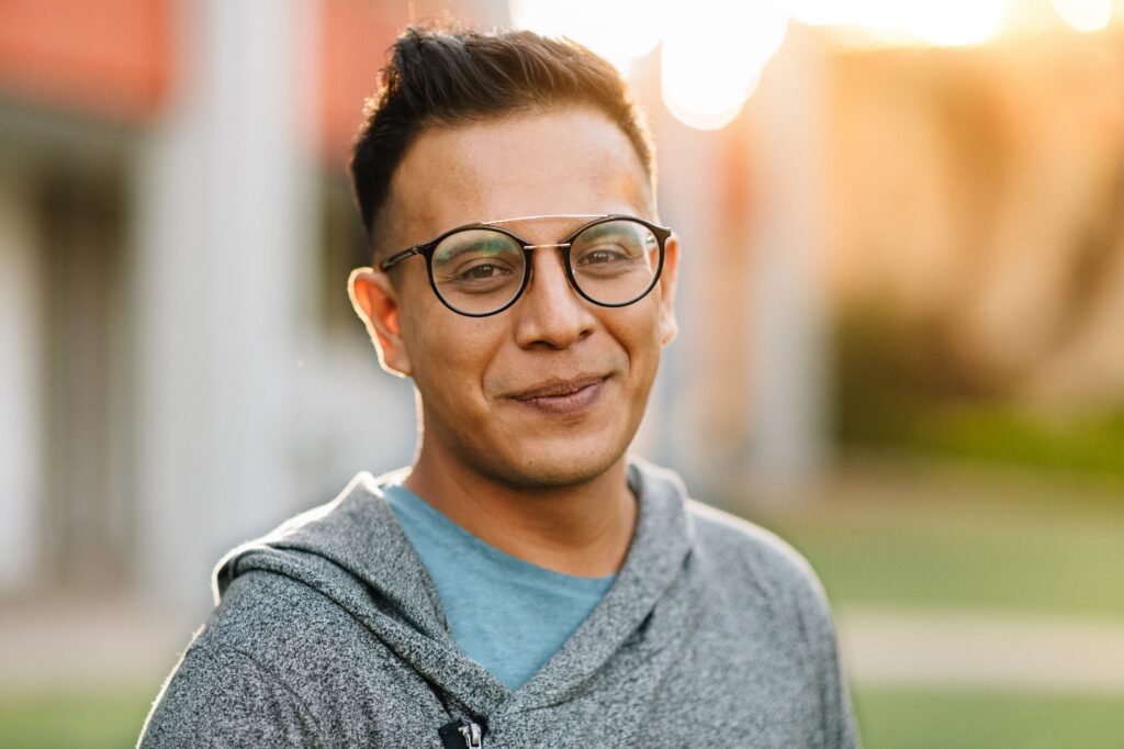 Smiling man in glasses