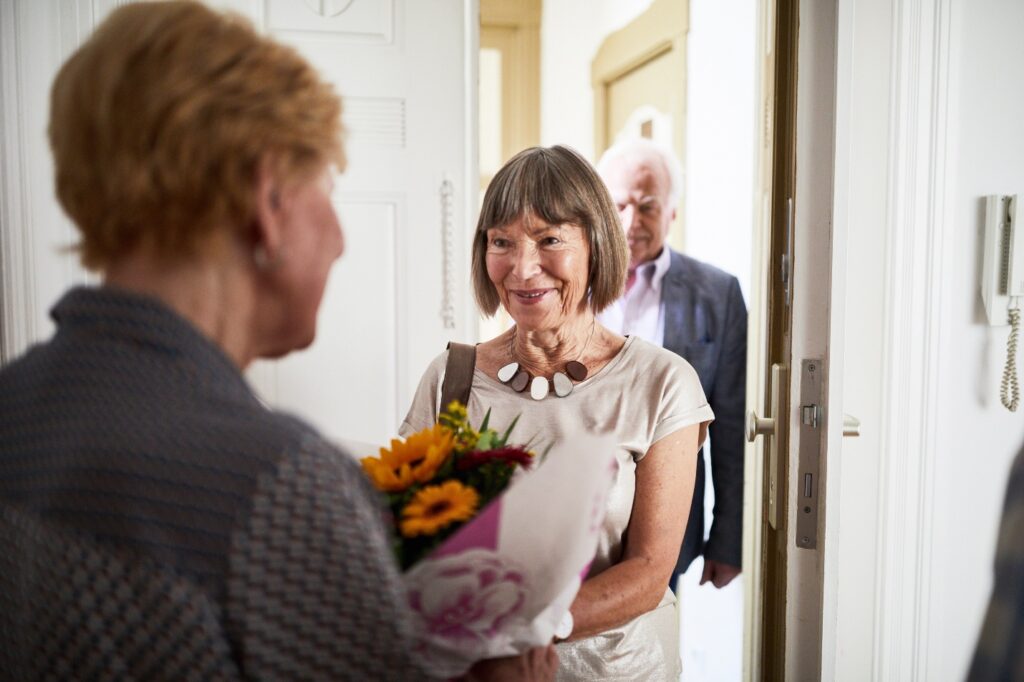 People greeting one another