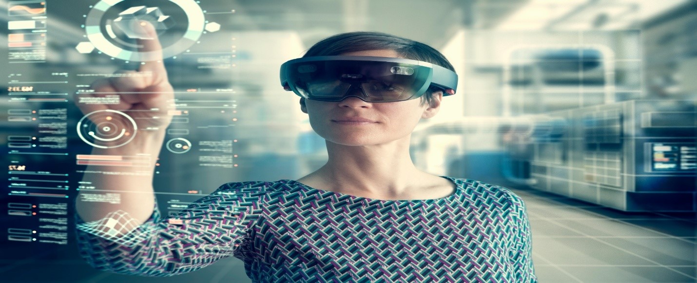Person wearing mixed reality smartglasses touching transparent screen